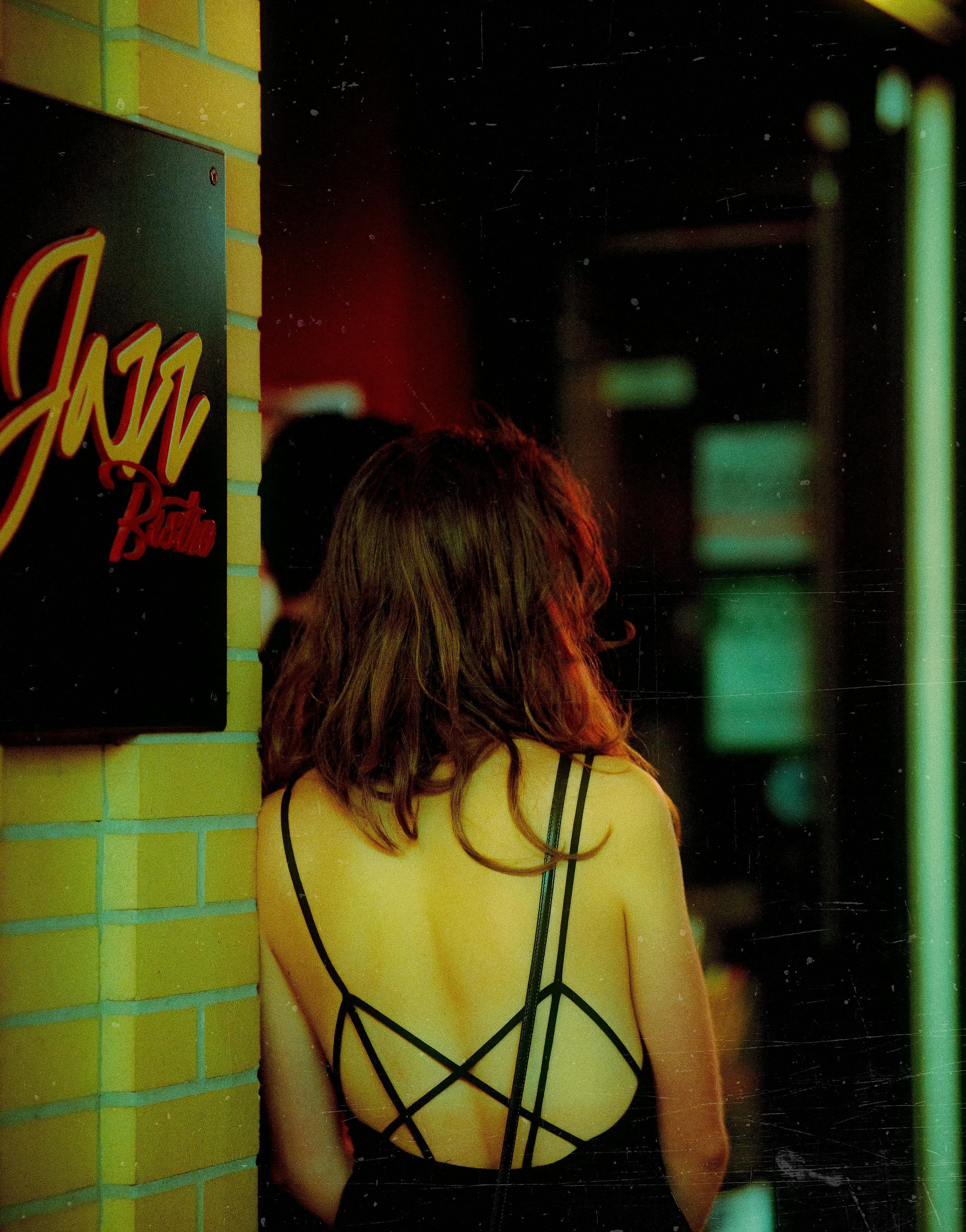 A girl standing in a jazz club